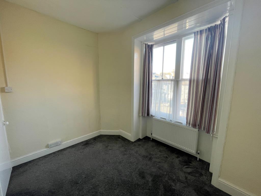 Lot: 138 - MIXED-USE PROPERTY IN HIGH STREET LOCATION - Bedroom one